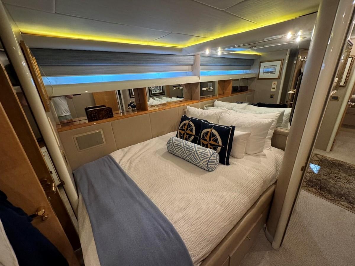 a bed in a room aboard DARE TO DREAM Yacht for Sale
