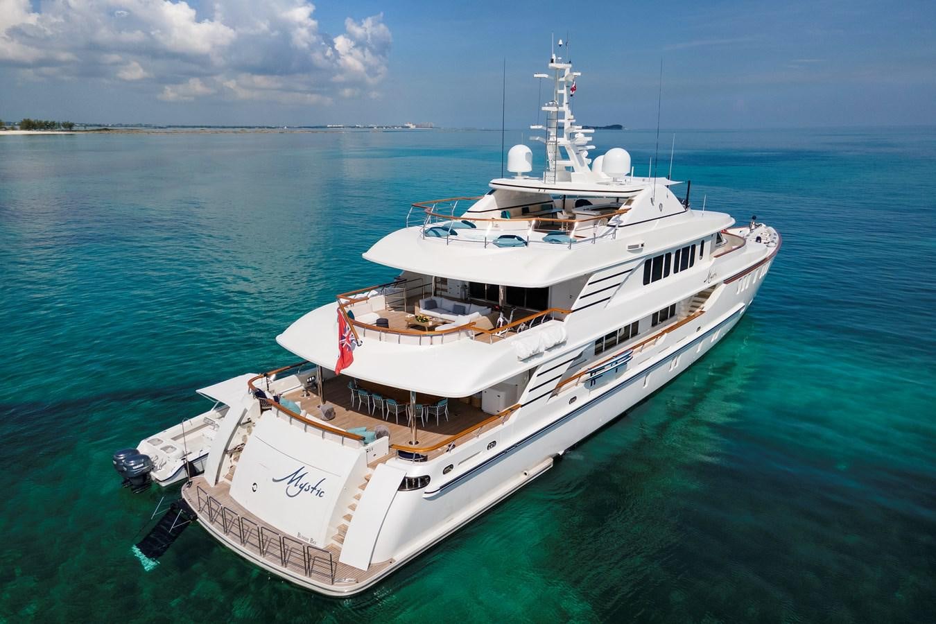 a large white ship in the water aboard MYSTIC Yacht for Sale