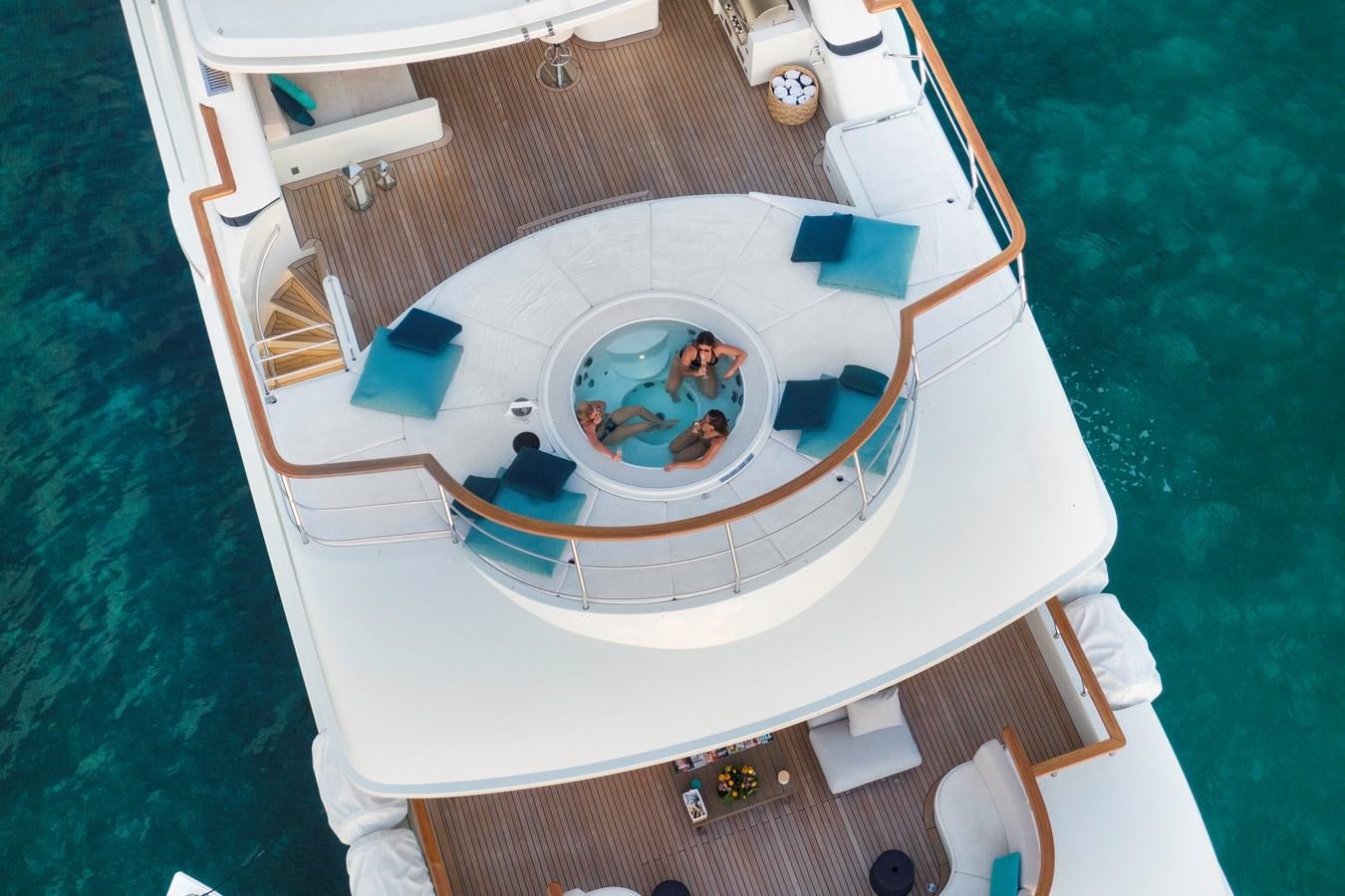 a house with a swimming pool aboard MYSTIC Yacht for Sale