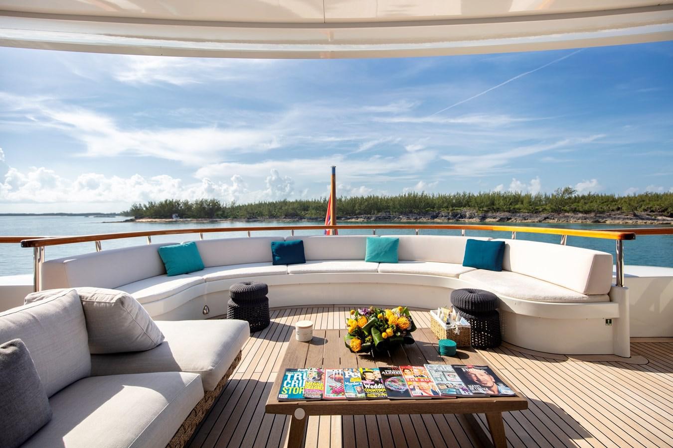 a living room with a large window aboard MYSTIC Yacht for Sale