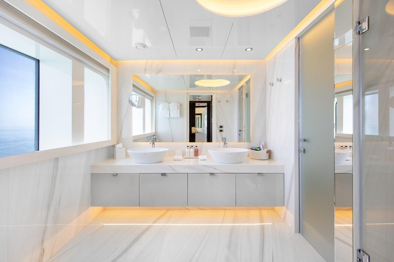 a bathroom with sinks and mirrors aboard MYSTIC Yacht for Sale