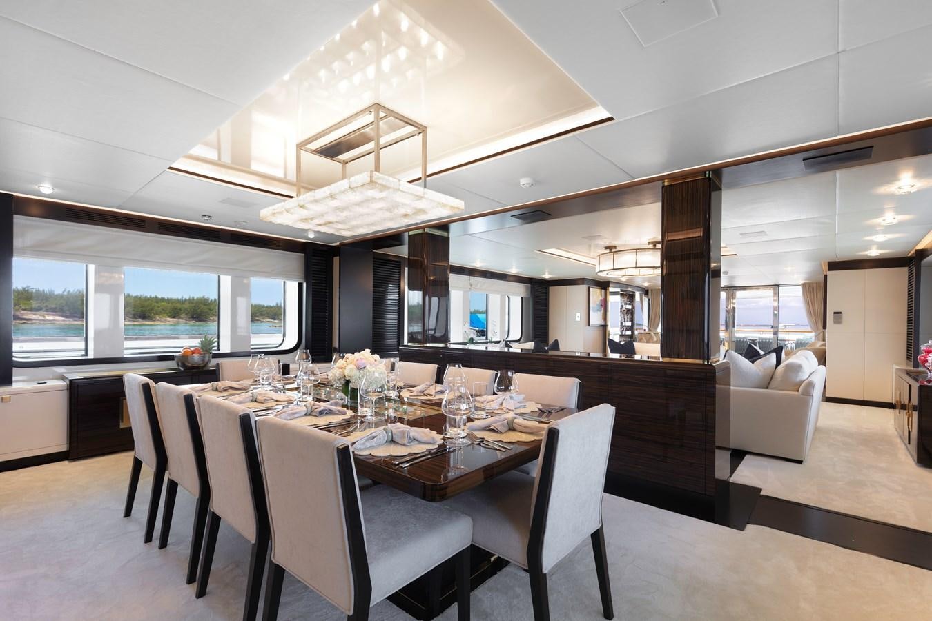 a dining room with a table and chairs aboard MYSTIC Yacht for Sale