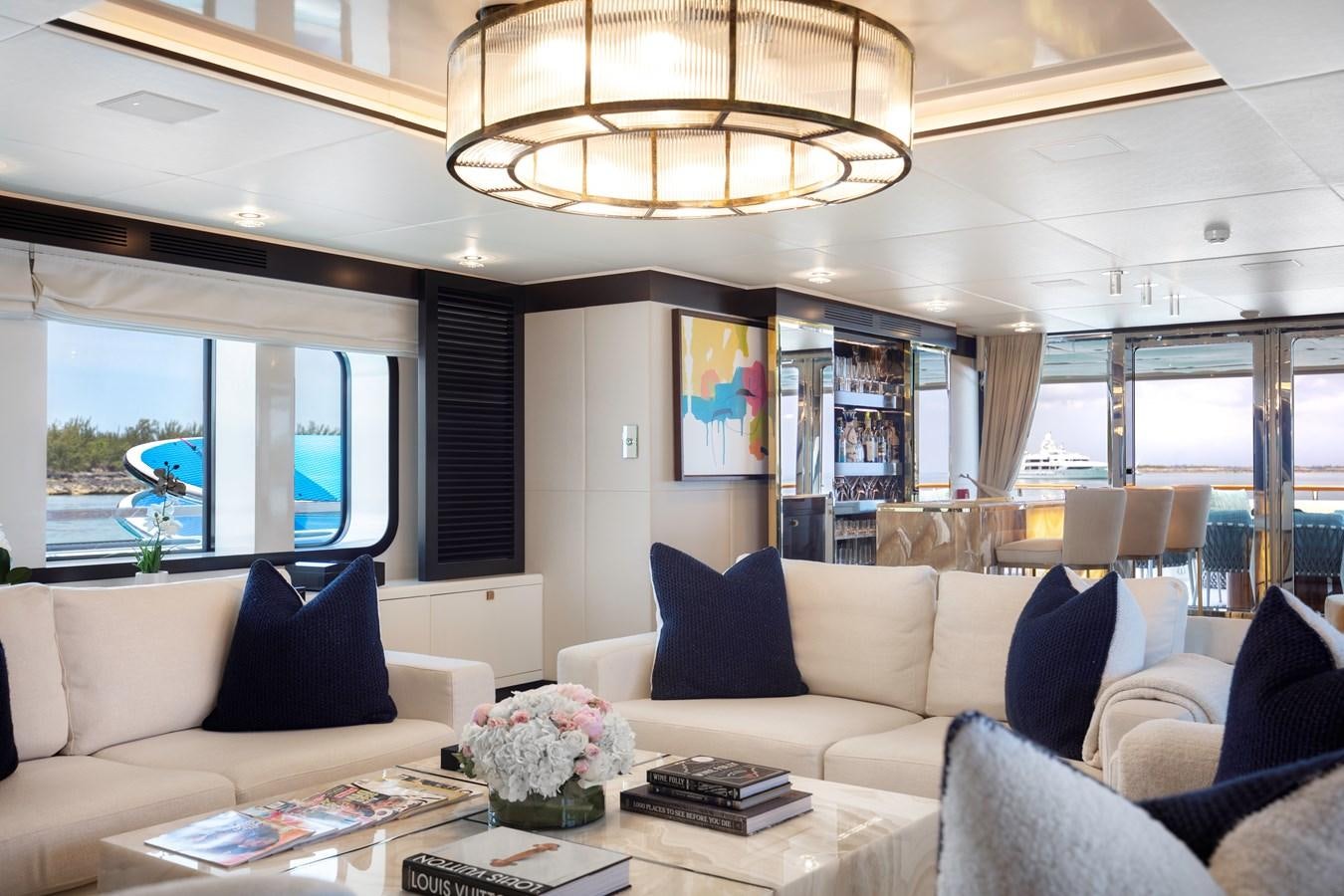 a living room with a large window aboard MYSTIC Yacht for Sale