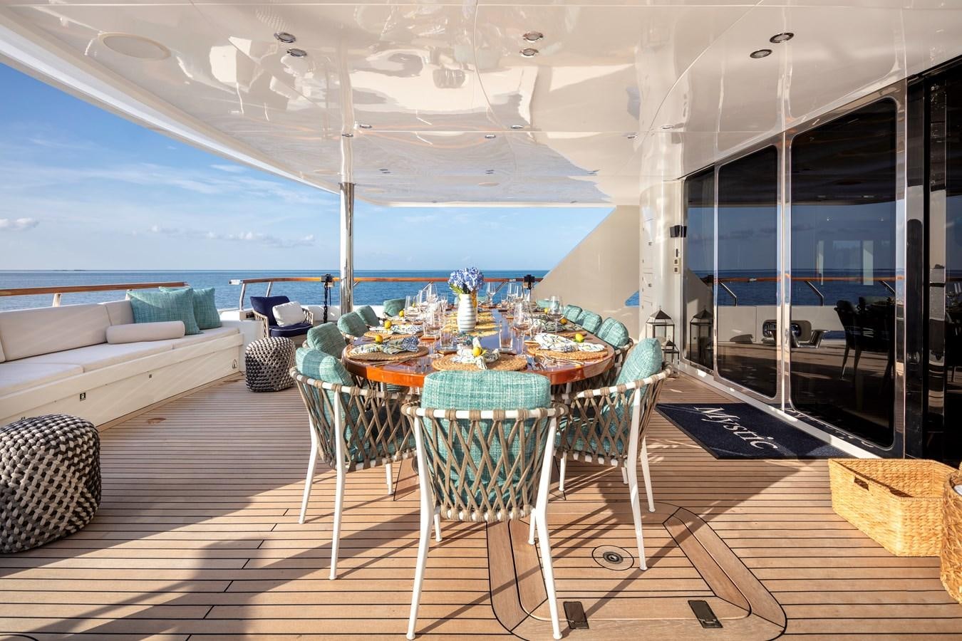a room with a table and chairs aboard MYSTIC Yacht for Sale