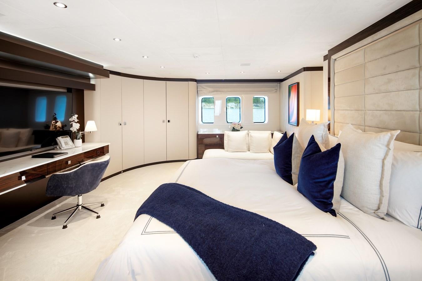 a large bed in a room aboard MYSTIC Yacht for Sale