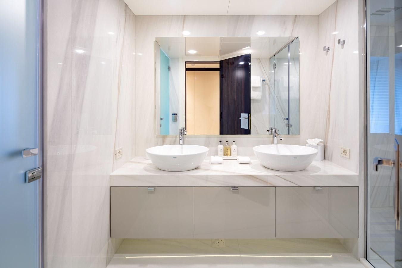 a bathroom with two sinks aboard MYSTIC Yacht for Sale