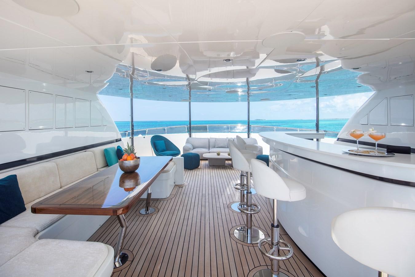 a room with a table and chairs aboard MYSTIC Yacht for Sale