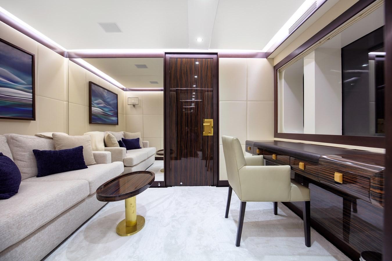 a room with a couch and a piano aboard MYSTIC Yacht for Sale