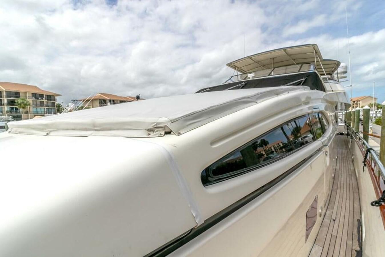 a white car with a roof aboard SAND DOLLAR Yacht for Sale