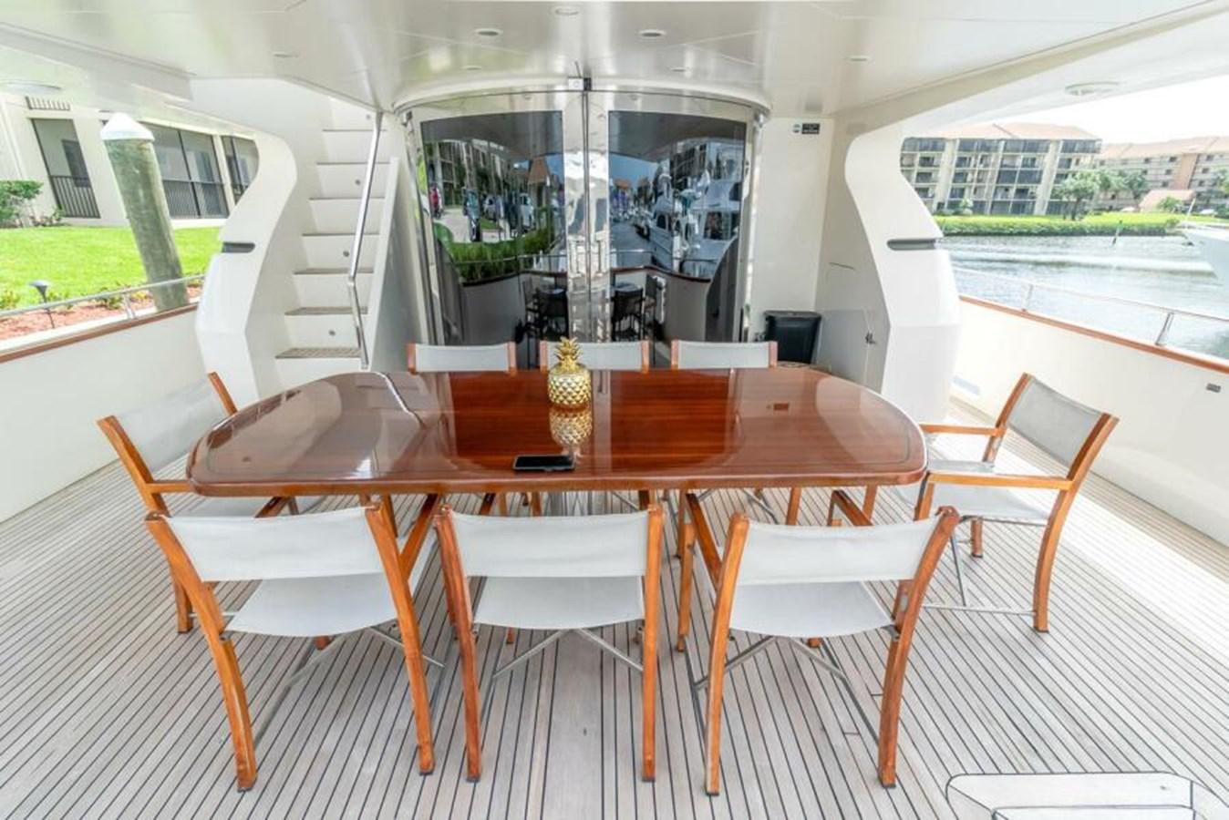 a table with chairs around it aboard SAND DOLLAR Yacht for Sale