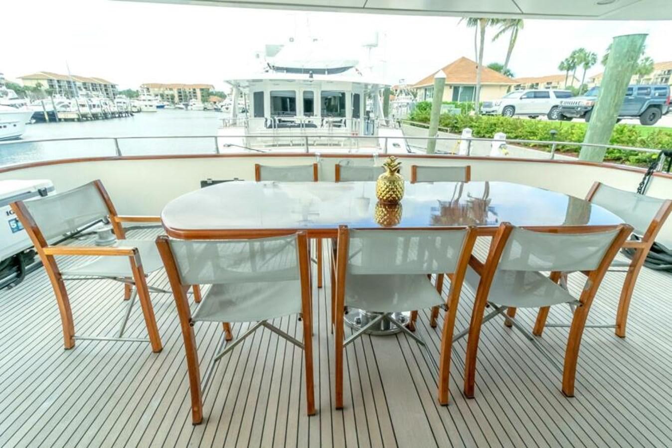 a table with chairs around it aboard SAND DOLLAR Yacht for Sale