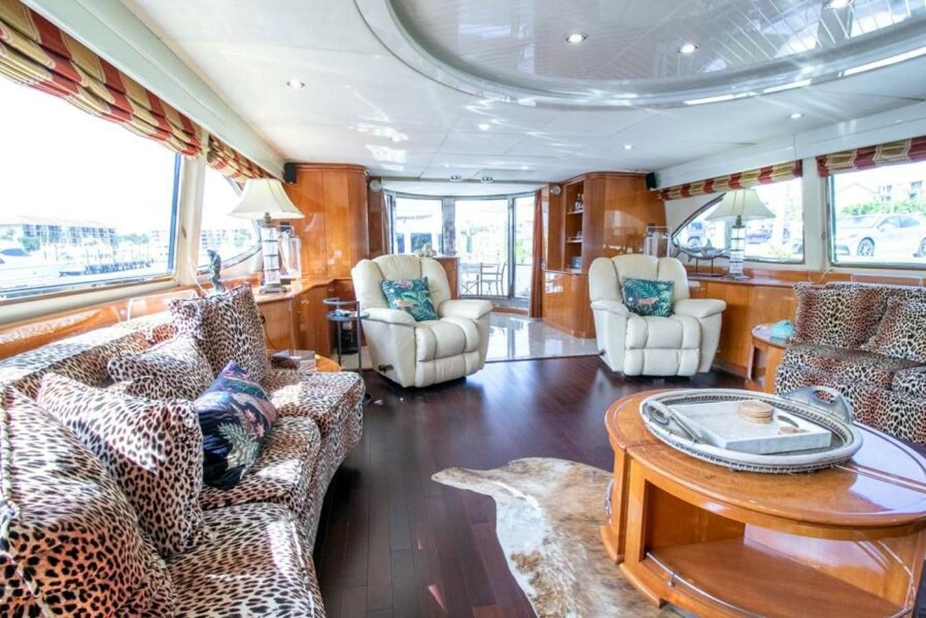 a living room with a large window aboard SAND DOLLAR Yacht for Sale