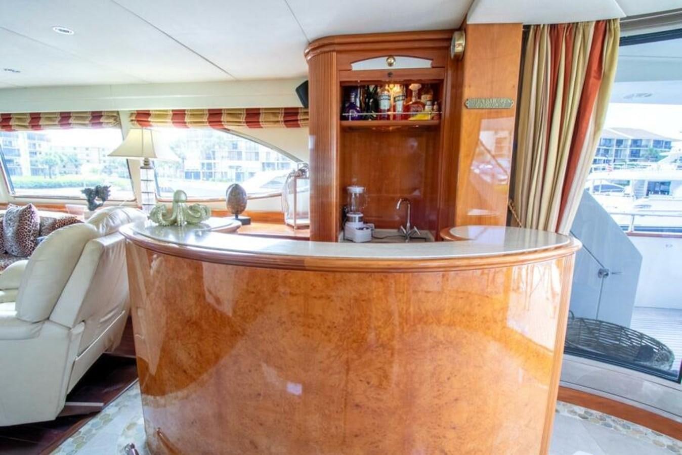 a kitchen with a large island aboard SAND DOLLAR Yacht for Sale