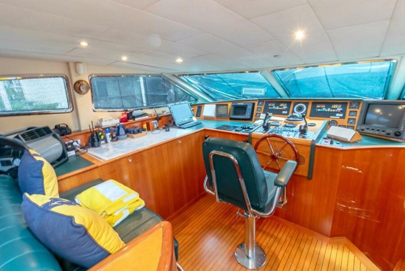 a room with a desk and chairs aboard SAND DOLLAR Yacht for Sale