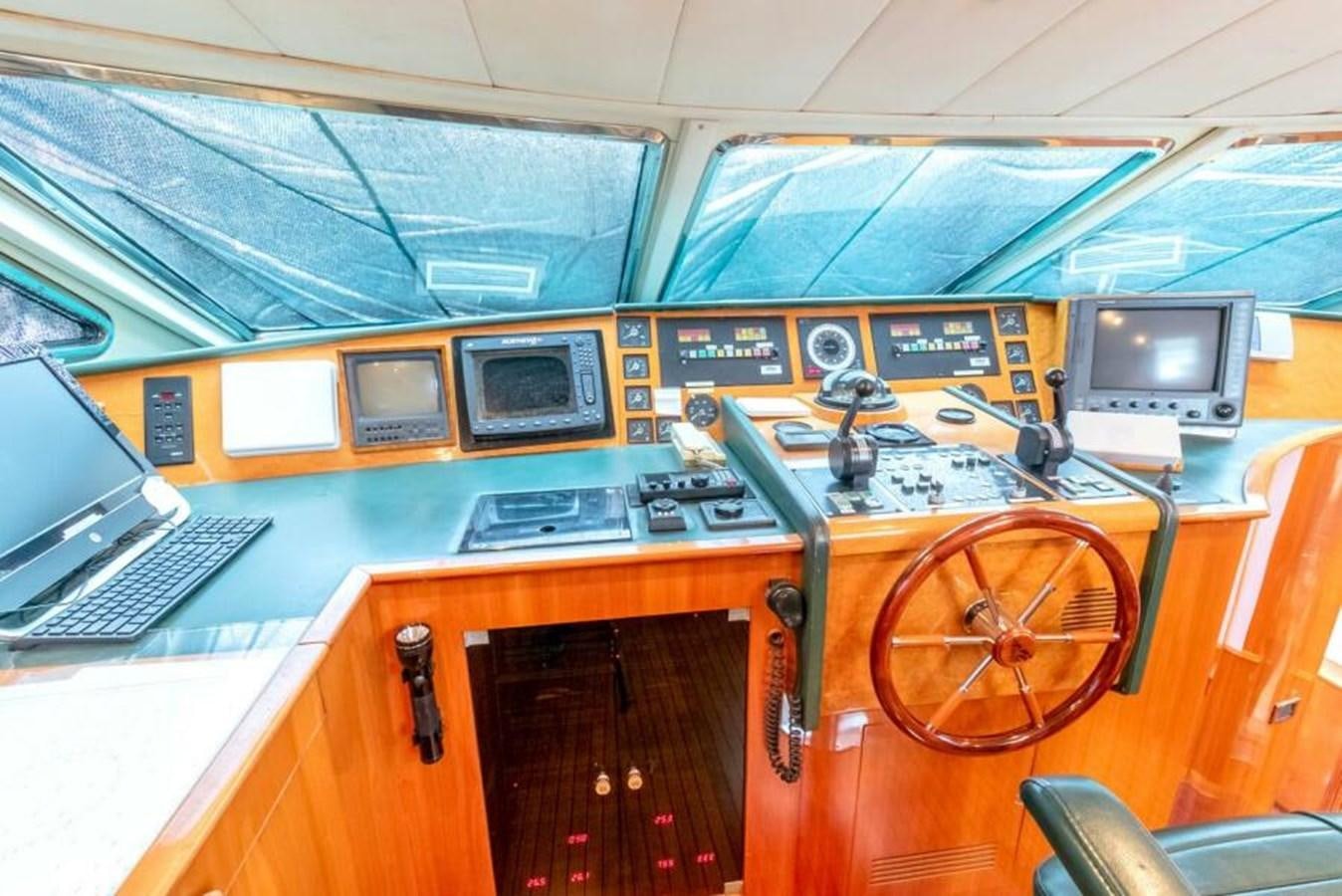 a train with a large orange wheel aboard SAND DOLLAR Yacht for Sale