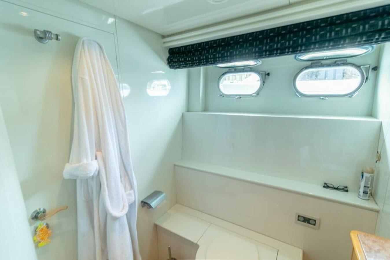 a bathroom with a towel on the wall aboard SAND DOLLAR Yacht for Sale
