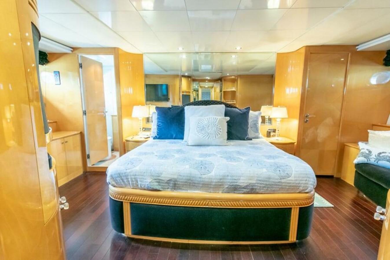 a bed in a room aboard SAND DOLLAR Yacht for Sale