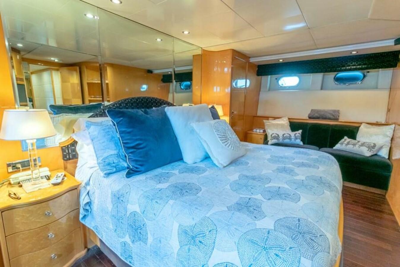 a bed in a room aboard SAND DOLLAR Yacht for Sale