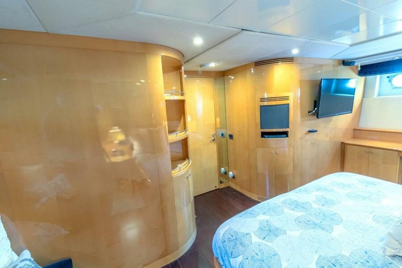 a bed in a room aboard SAND DOLLAR Yacht for Sale
