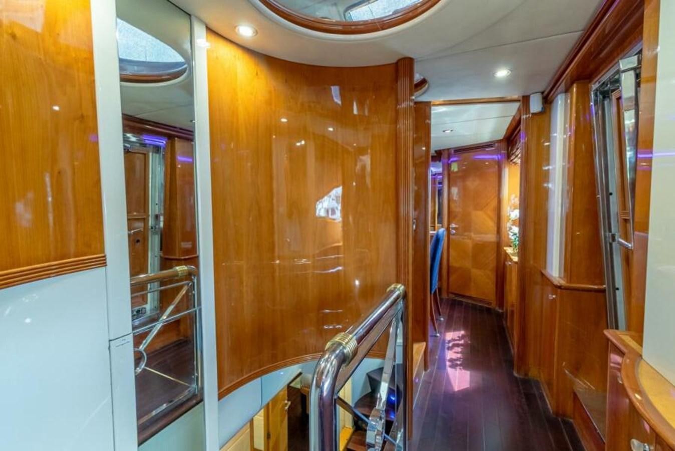 a hallway with wooden walls aboard SAND DOLLAR Yacht for Sale