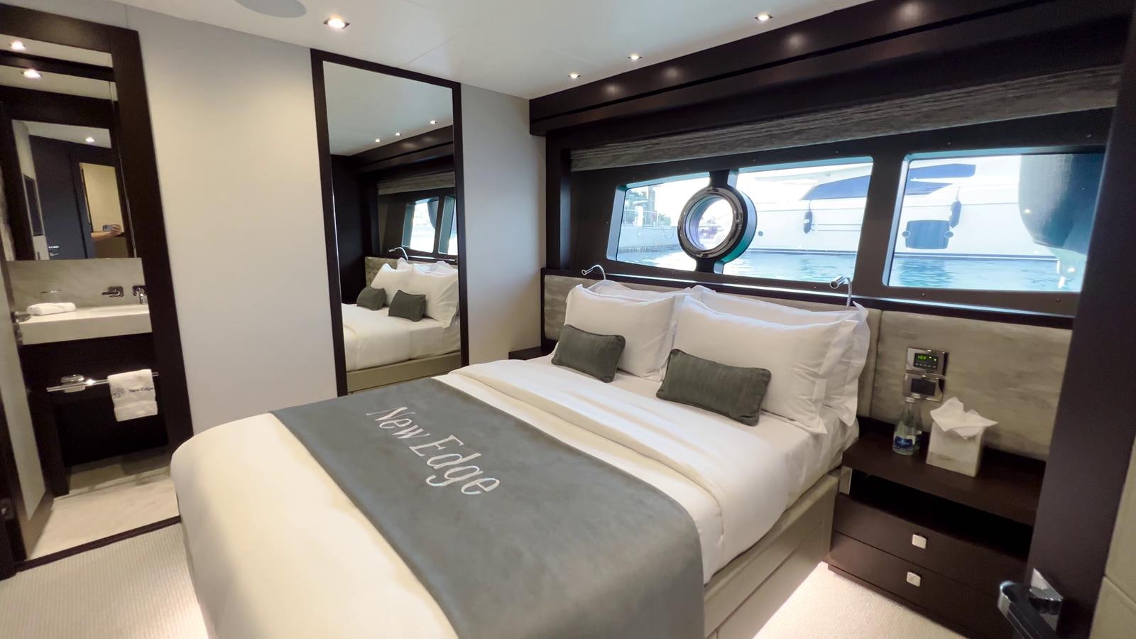 a bed in a room aboard NEW EDGE Yacht for Sale