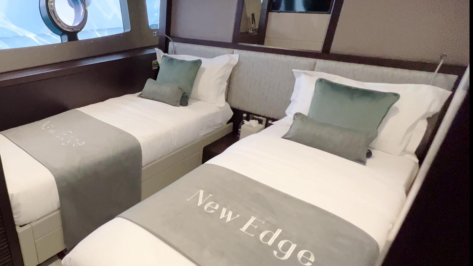a couple of beds in a room aboard NEW EDGE Yacht for Sale