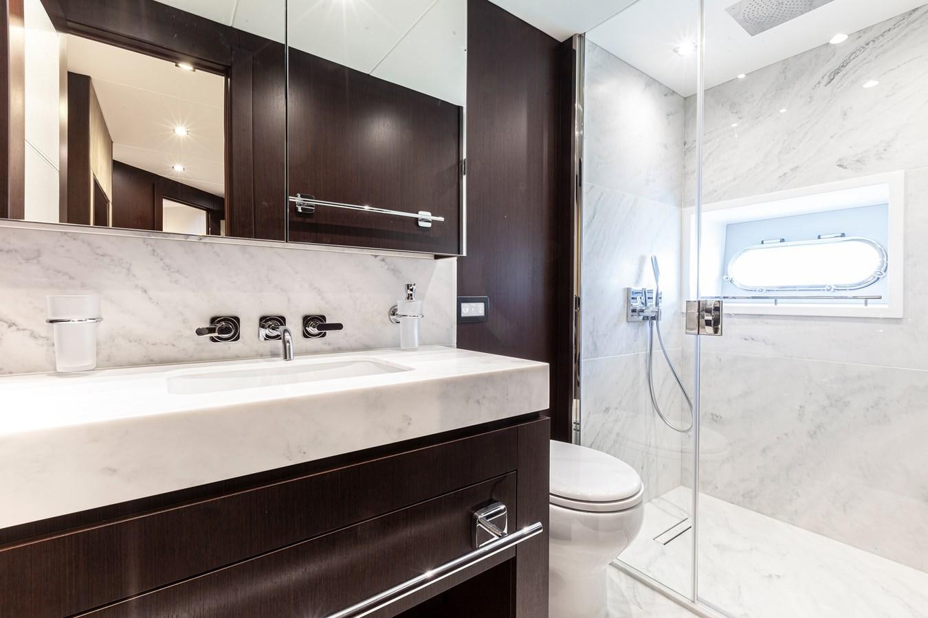 a bathroom with a sink and a toilet aboard NEW EDGE Yacht for Sale