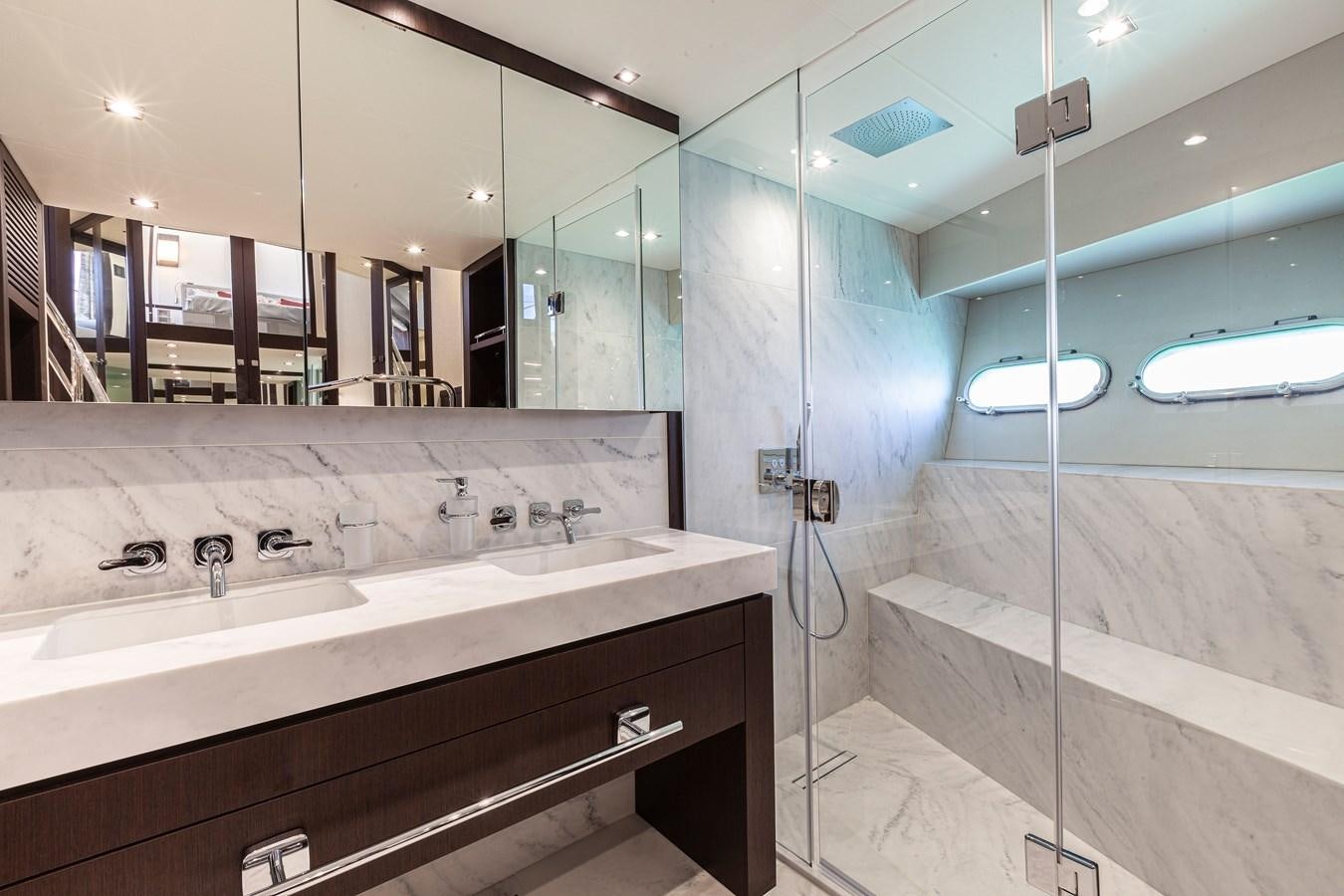 a bathroom with a large mirror aboard NEW EDGE Yacht for Sale