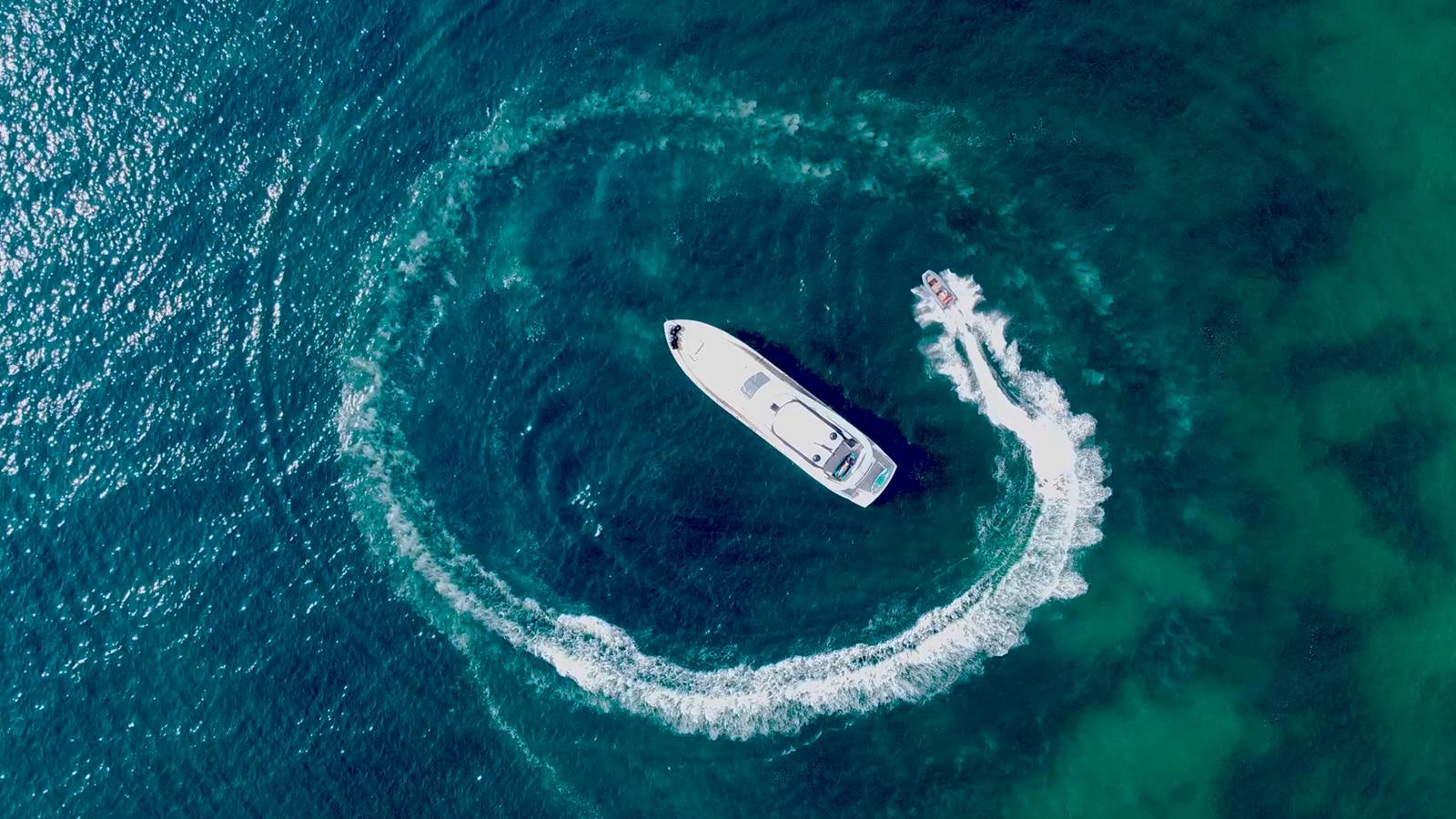 a white boat in the water aboard NEW EDGE Yacht for Sale