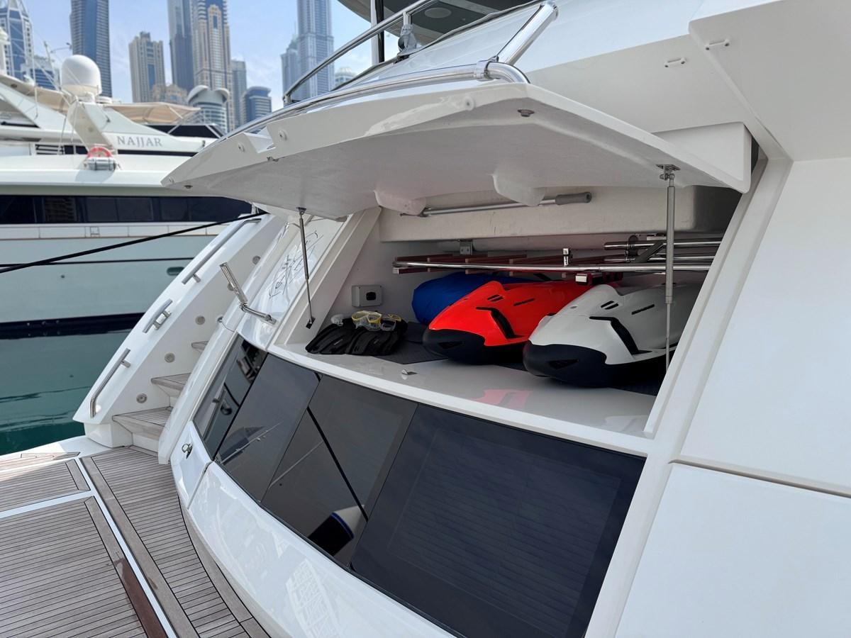 a boat with a red life jacket aboard NEW EDGE Yacht for Sale