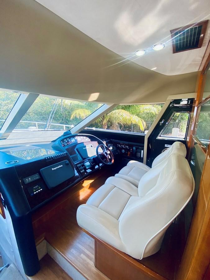 a room with a desk and a chair aboard GRAND CRU Yacht for Sale