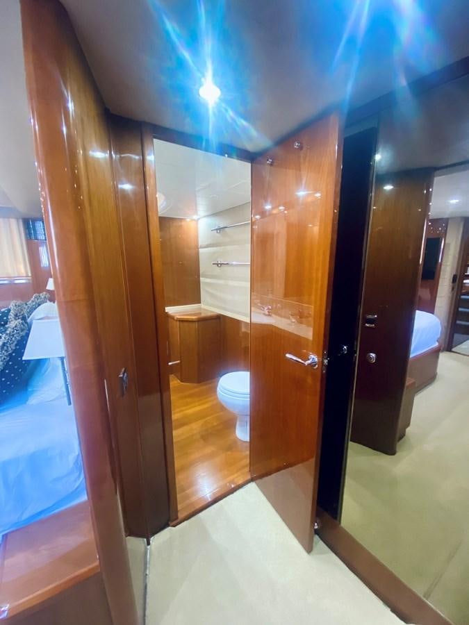 a room with a wood door aboard GRAND CRU Yacht for Sale