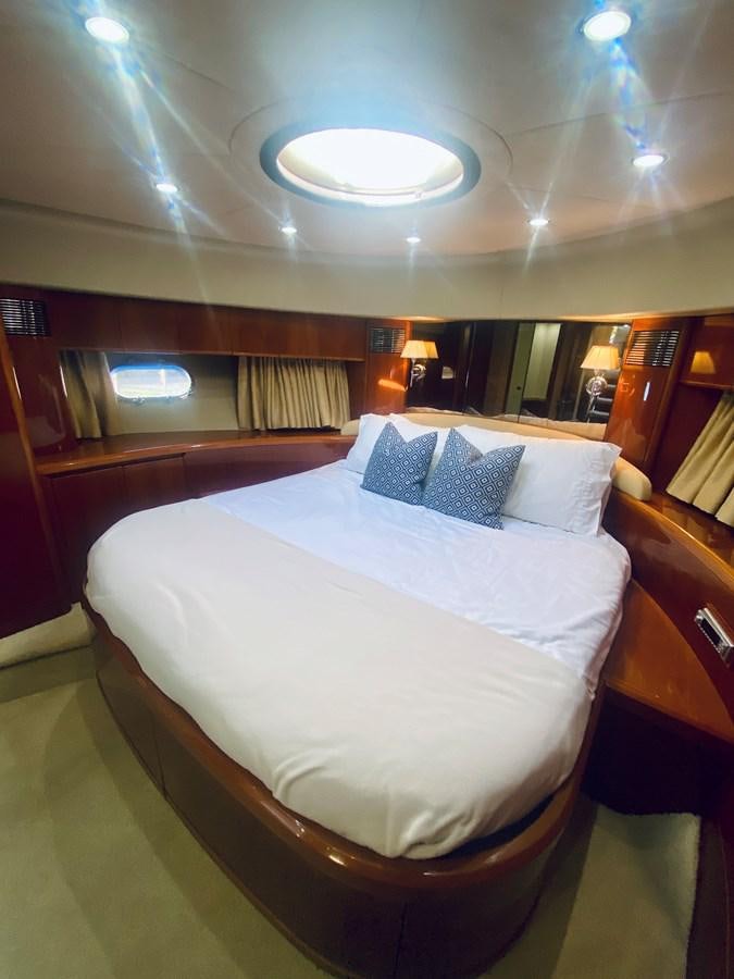 a bed in a room aboard GRAND CRU Yacht for Sale
