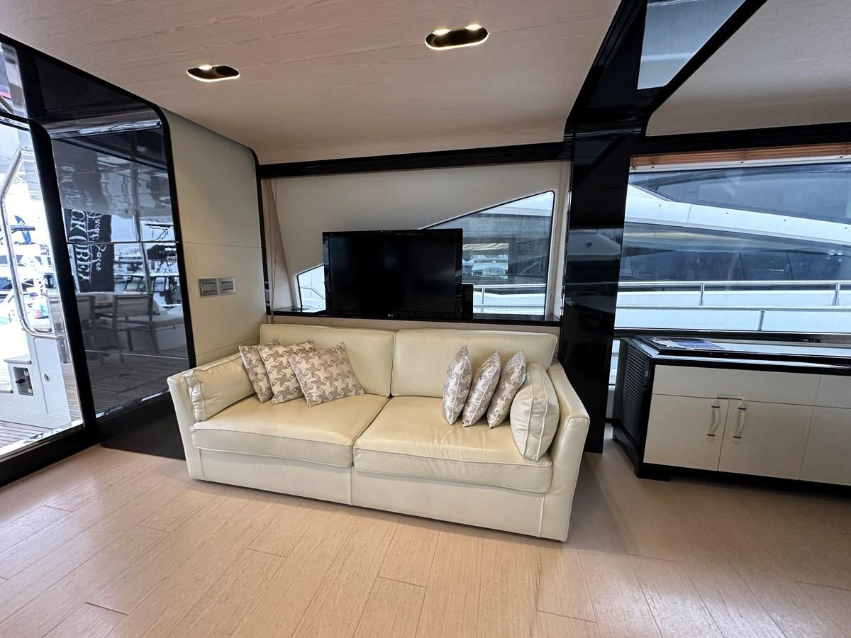 a living room with a couch aboard SLINGSHOT Yacht for Sale