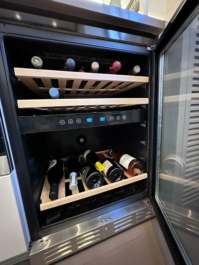 a black oven with a silver and black oven door and a silver oven aboard SLINGSHOT Yacht for Sale