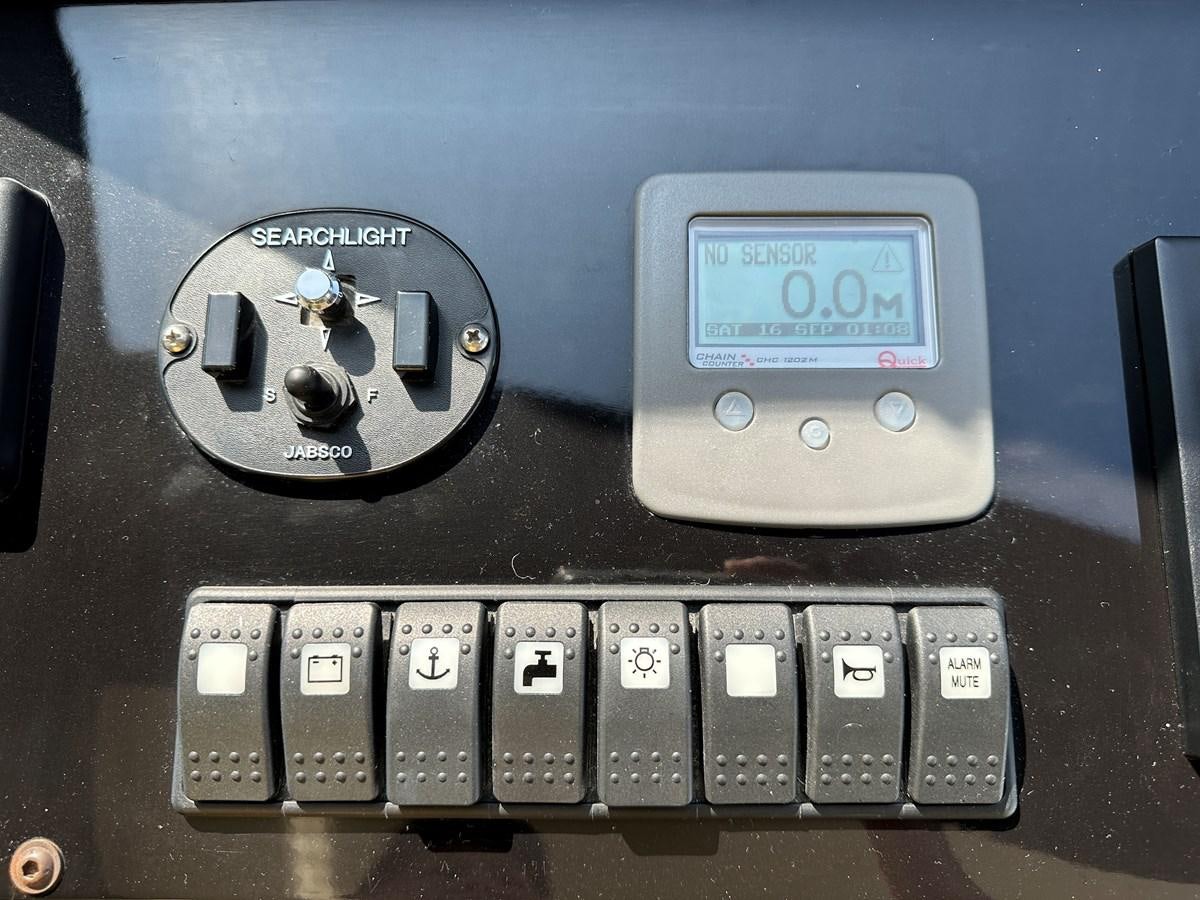 a silver and black electronic device aboard SLINGSHOT Yacht for Sale