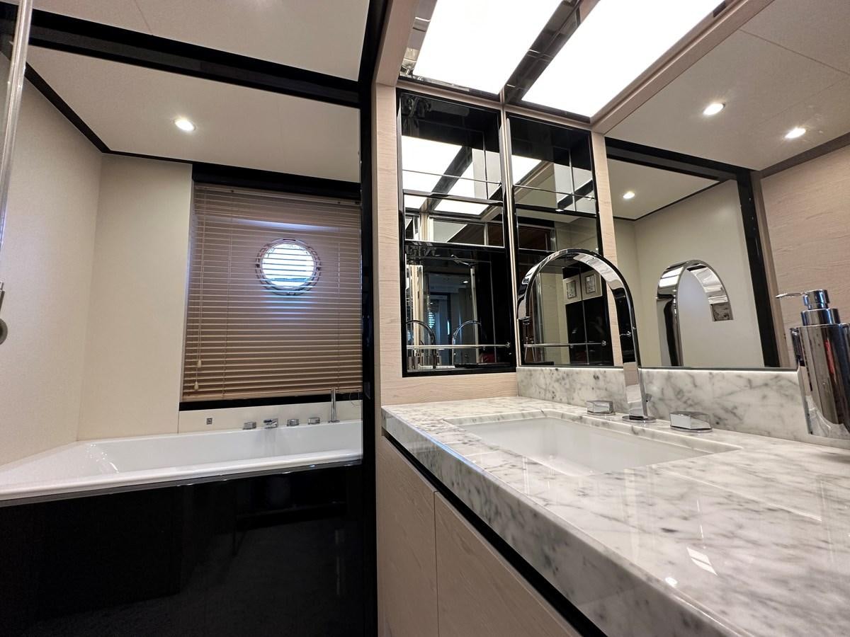 a bathroom with a large countertop aboard SLINGSHOT Yacht for Sale