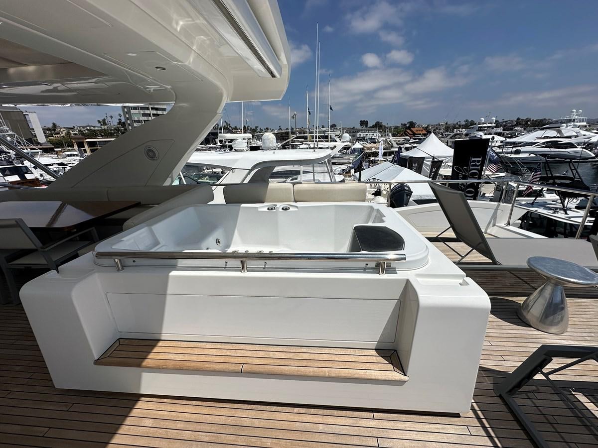 a boat on a deck aboard SLINGSHOT Yacht for Sale