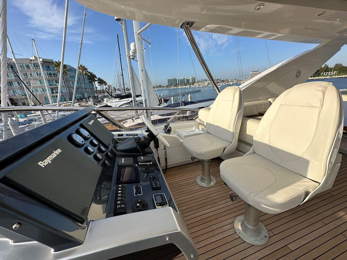 a boat with a laptop on it aboard SLINGSHOT Yacht for Sale