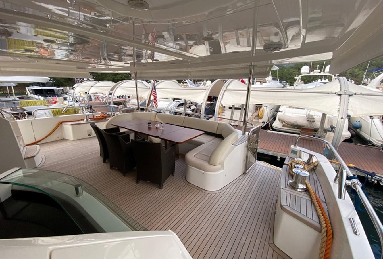 a boat with tables and chairs aboard SEZI MEGA Yacht for Sale
