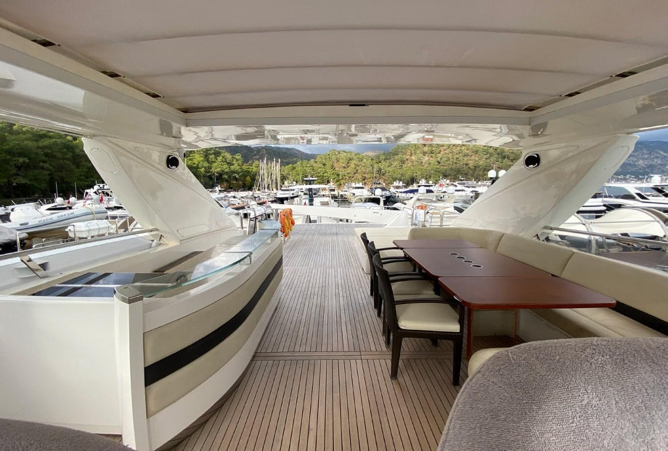 a row of white yachts aboard SEZI MEGA Yacht for Sale