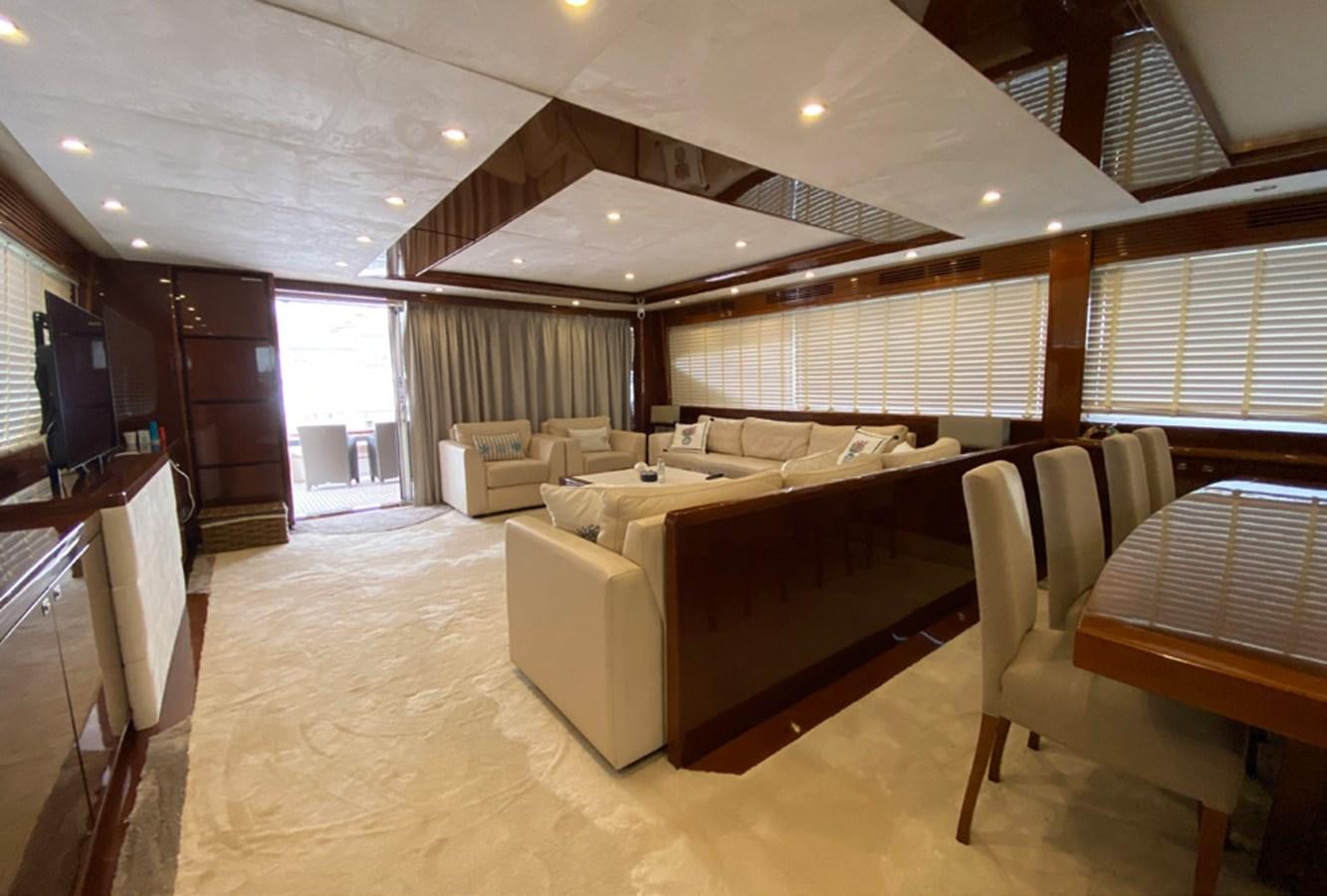 a large room with a bed and a tv aboard SEZI MEGA Yacht for Sale
