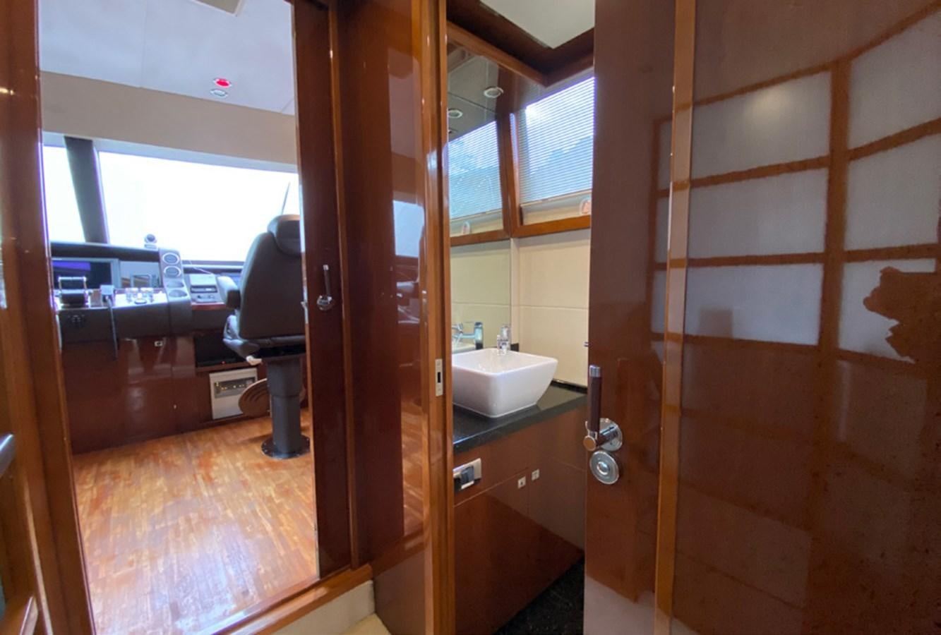 a bathroom with a sink and a toilet aboard SEZI MEGA Yacht for Sale