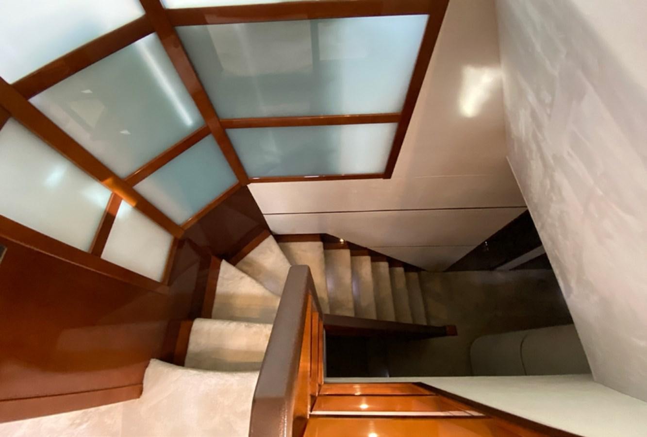 a staircase with a white ceiling aboard SEZI MEGA Yacht for Sale