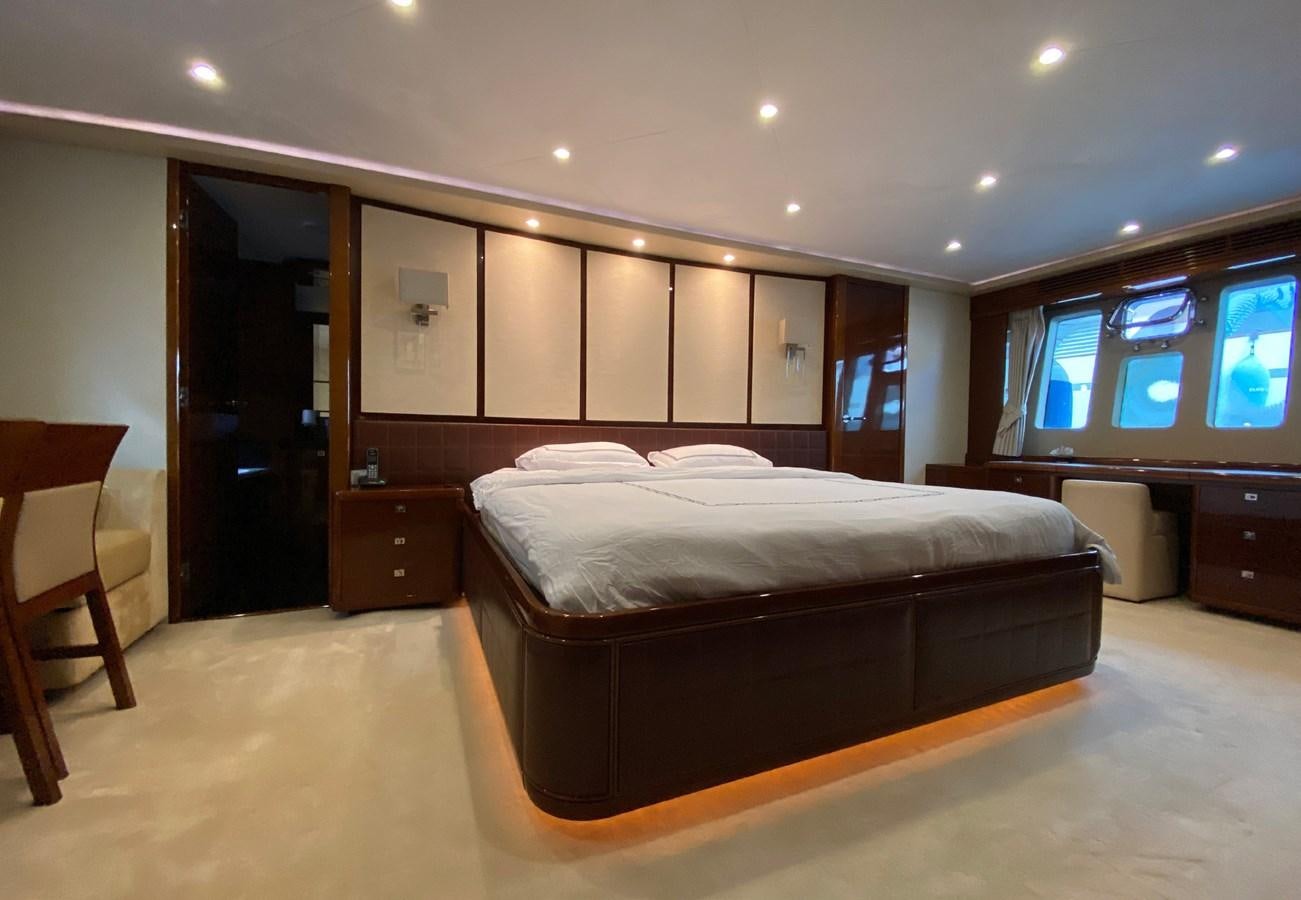 a bed in a room aboard SEZI MEGA Yacht for Sale