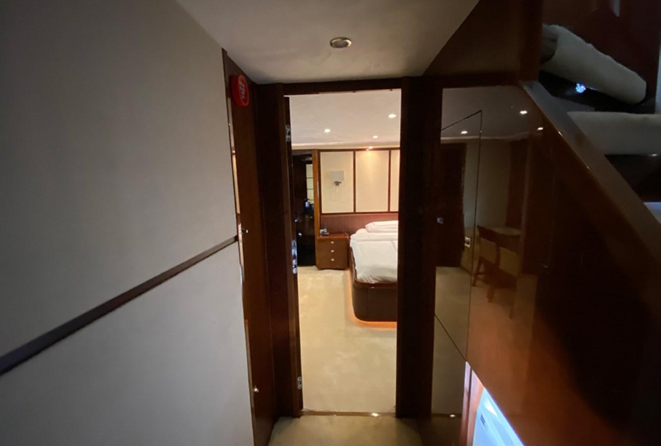 a hallway with a red sign aboard SEZI MEGA Yacht for Sale