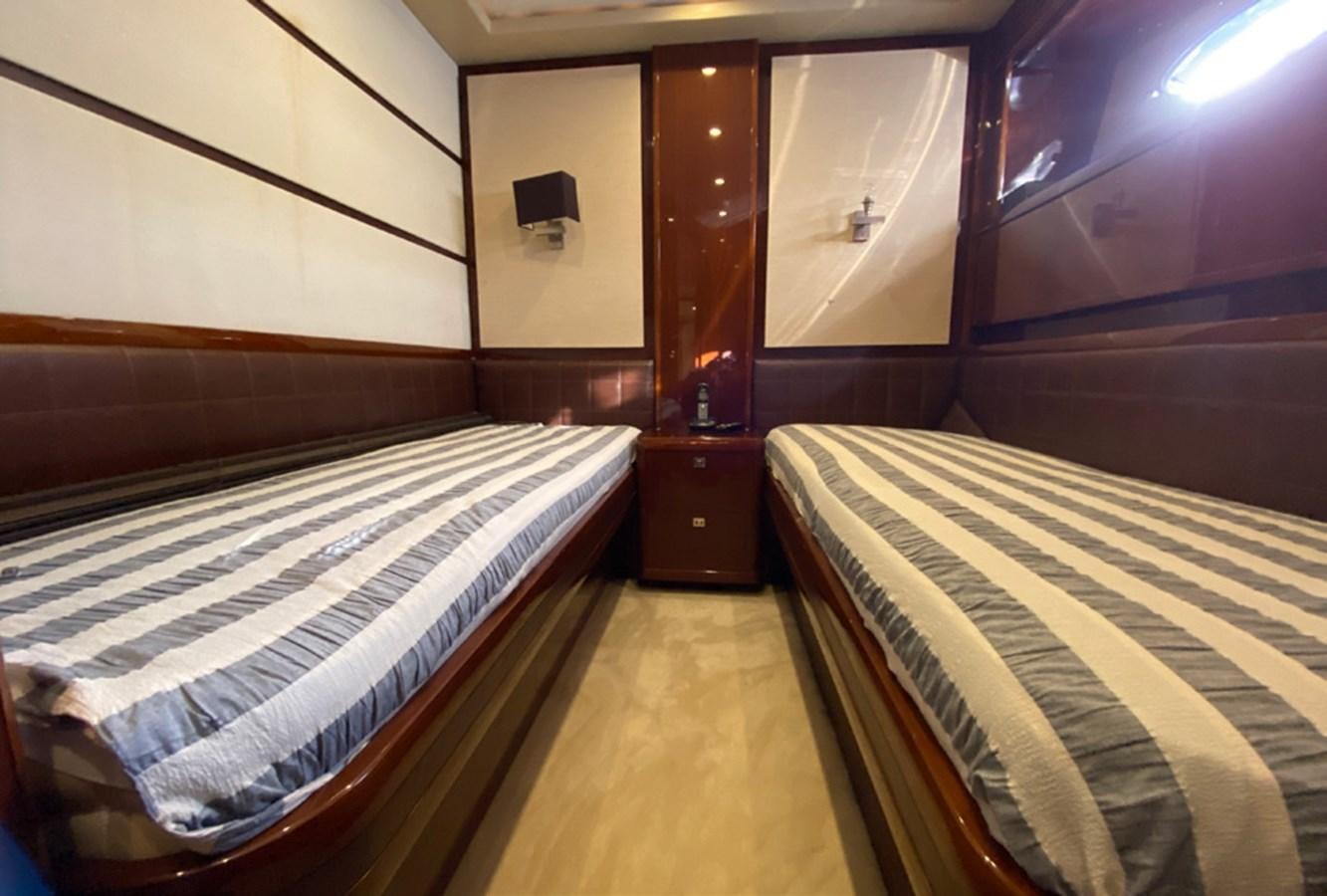 a room with two beds aboard SEZI MEGA Yacht for Sale