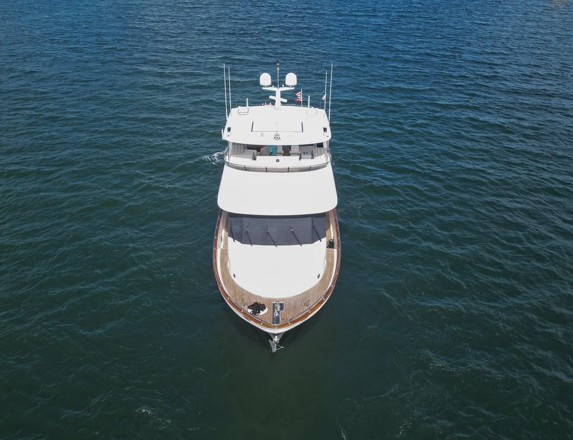 a white and black boat in the water aboard O A Yacht for Sale