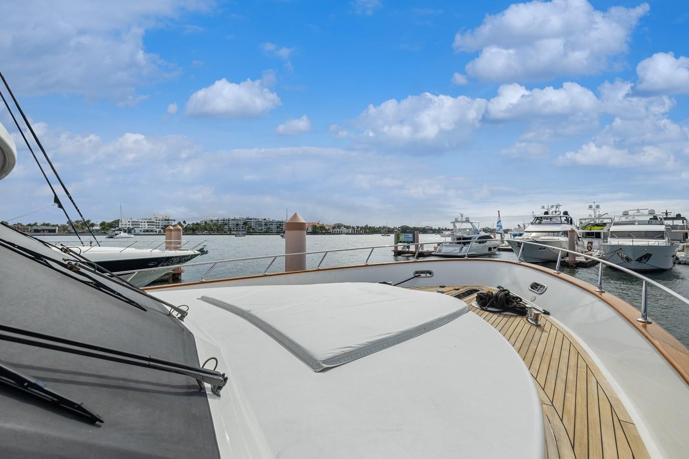 a boat docked at a pier aboard O A Yacht for Sale