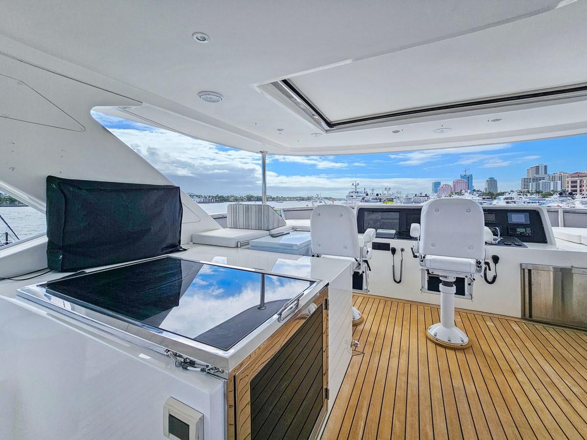 a deck with a large pool aboard O A Yacht for Sale